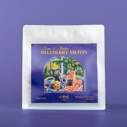 Ceri Coffee co-ferment package with a colorful label on a purple background